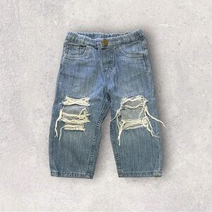 Distressed denim jeans